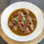 Spicy Nigerian Pepper Soup with Goat Meat for Cozy Nights 11 Nigerian Pepper Soup With Goat Meat