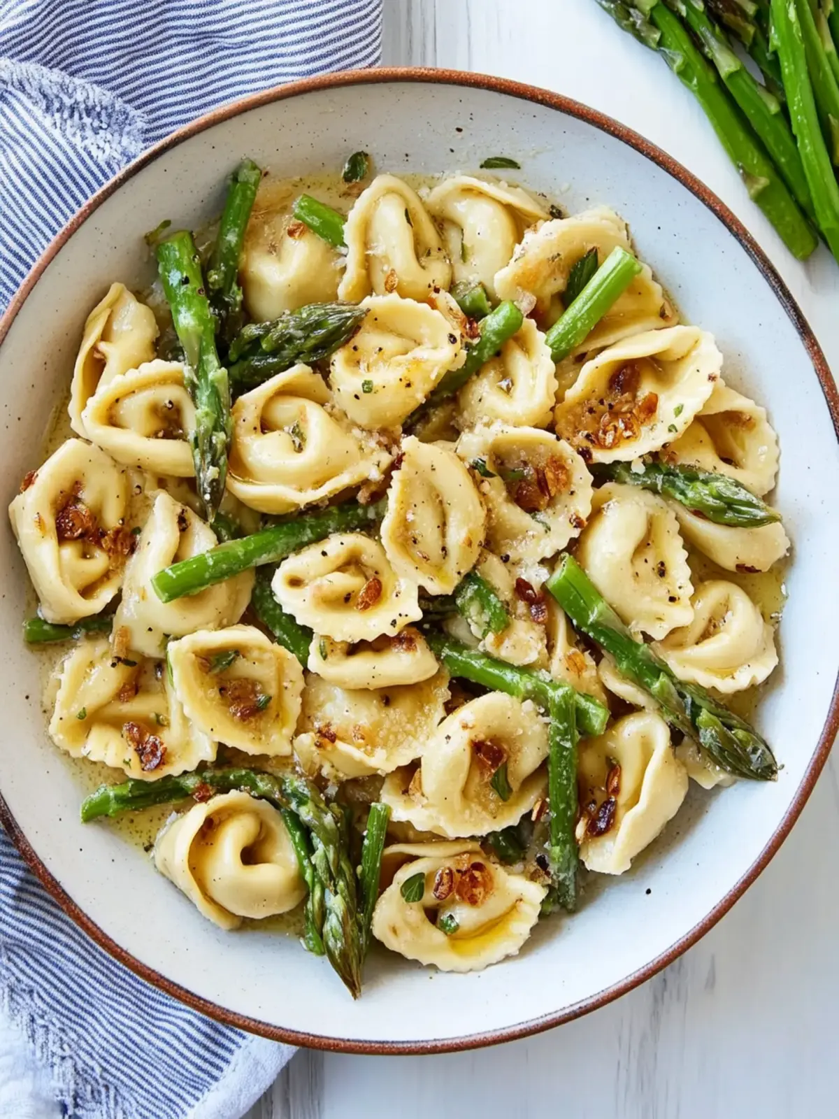 Irresistible Brown Butter Tortellini with Garlic & Asparagus 2 Brown Butter Tortellini with Toasted Garlic and Asparagus